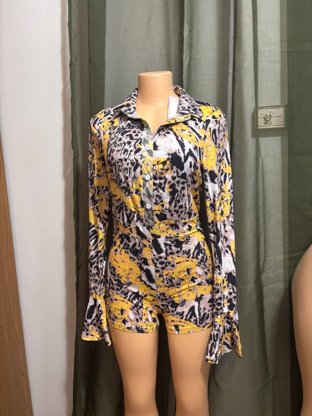Yellow & Black Printed Button Romper